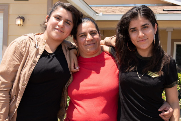 Homeowner Sandra Gonzalez with her daughters Abigail, 13, and Aurora, 17.