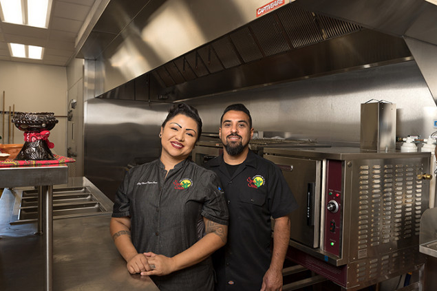 Chef Maria Parra Cano and husband Brian Cano in the kitchen at the Phoenix Indian School Visitor Center.